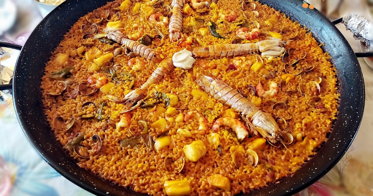 Arrossejat de pescado y espinacas