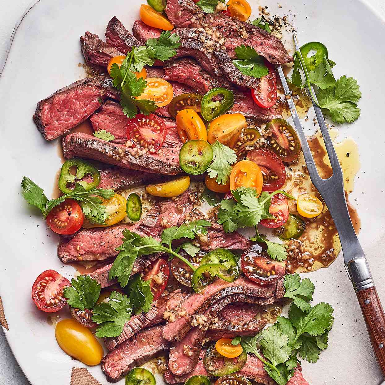Flank Steak with Tomato and Olive Salad