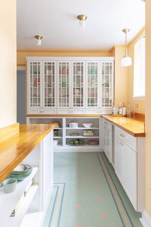 Vintage-Inspired Kitchen with Glass-Front Cabinets