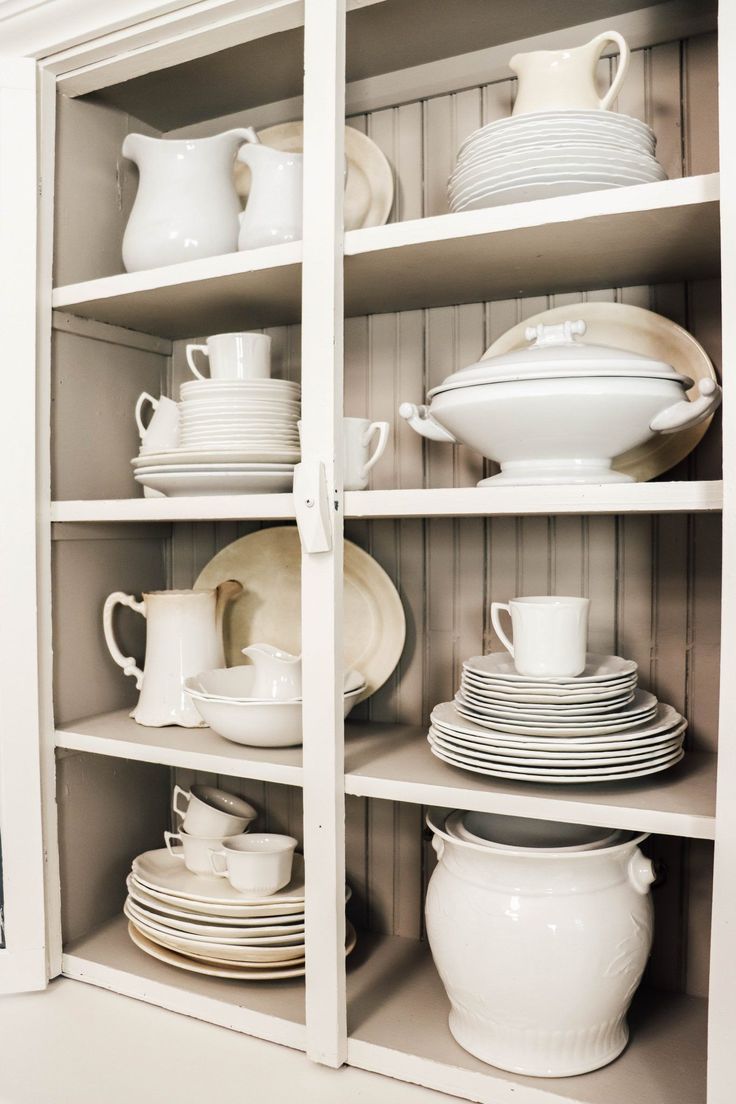 Antique-Inspired Kitchen with Plate Rack Cabinet
