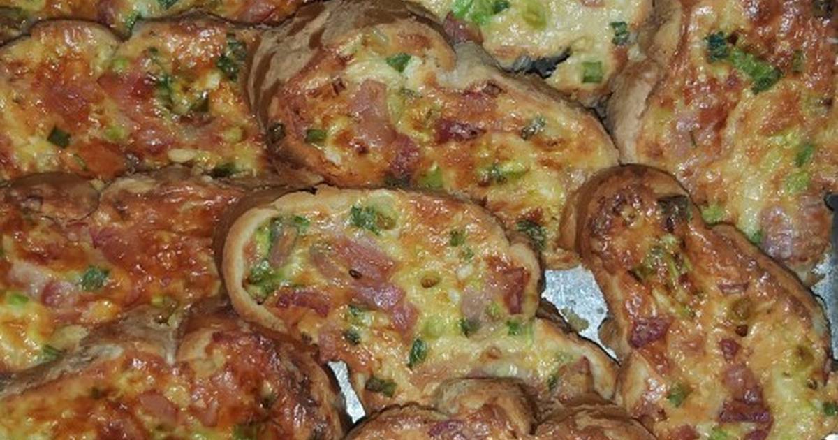Pizza de jamón crudo y melón con huevo poché