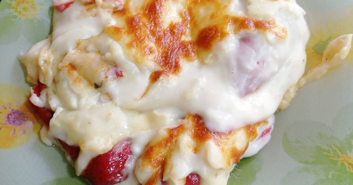 Pimientos del piquillo rellenos de bacalao en salsa verde con queso gratinado