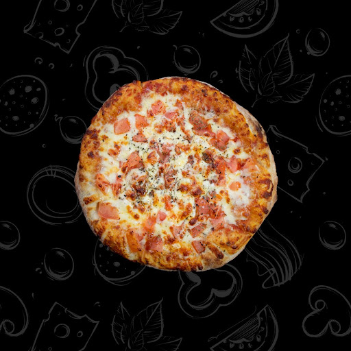 Pizza Napolitana con jamón serrano y rúcula