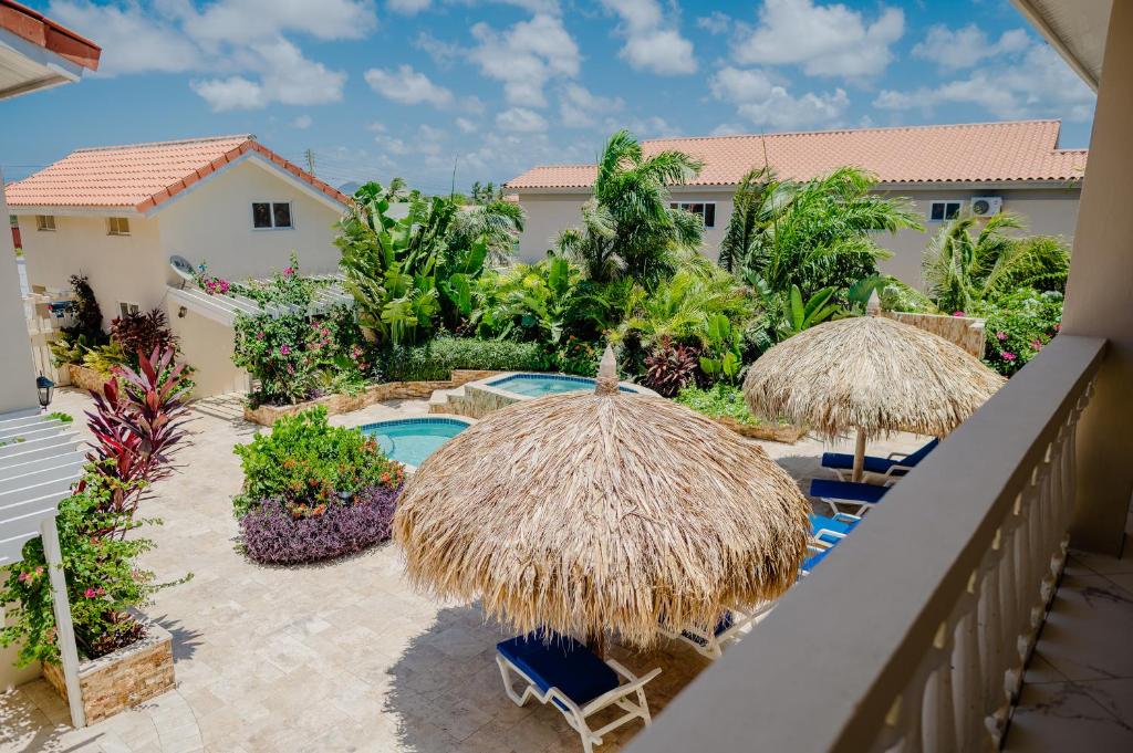 Beachfront Apartment with Tropical Gardens