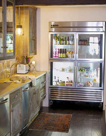 Industrial Country Kitchen with Glass-Front Refrigerator
