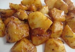Conejo al ajillo con patatas y zanahorias