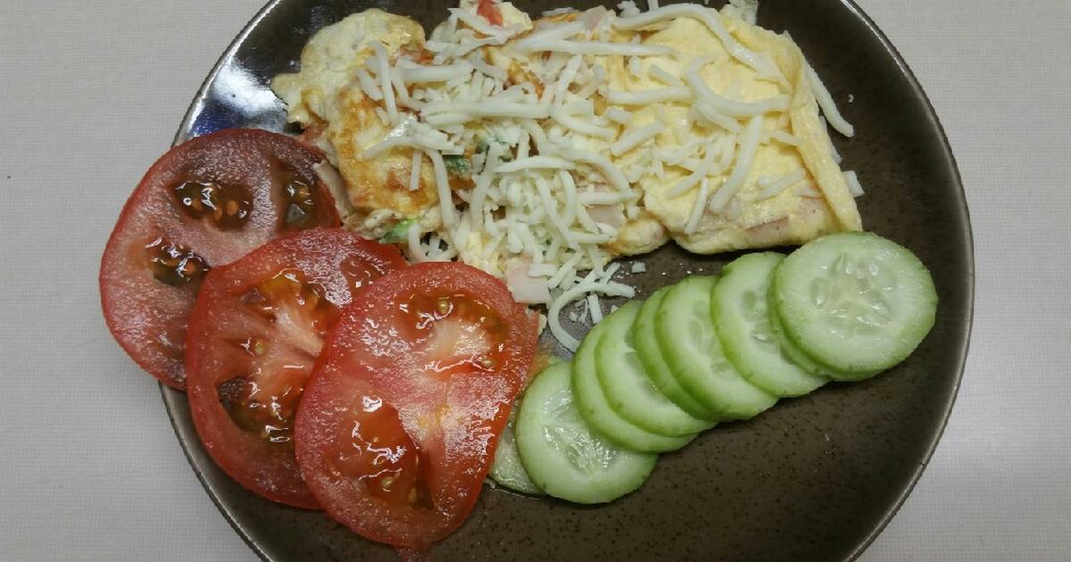 Revuelto de bacalao con espárragos trigueros y jamón ibérico