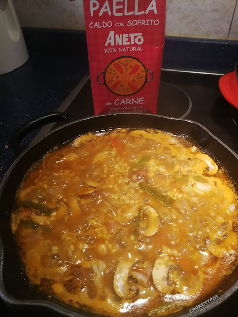 Arrossejat de pez espada y pimientos