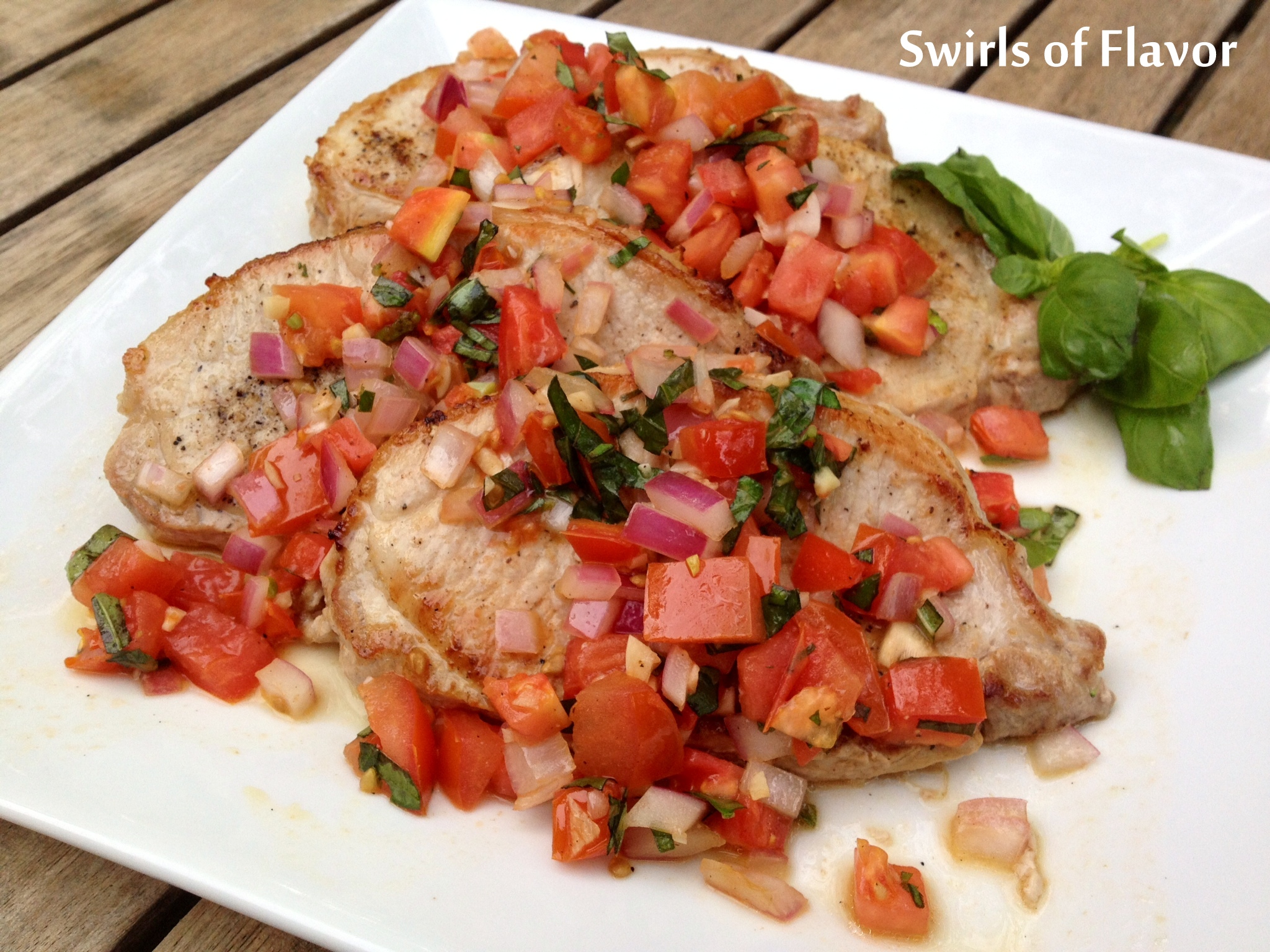 Boneless Pork Chops with Tomato and Basil