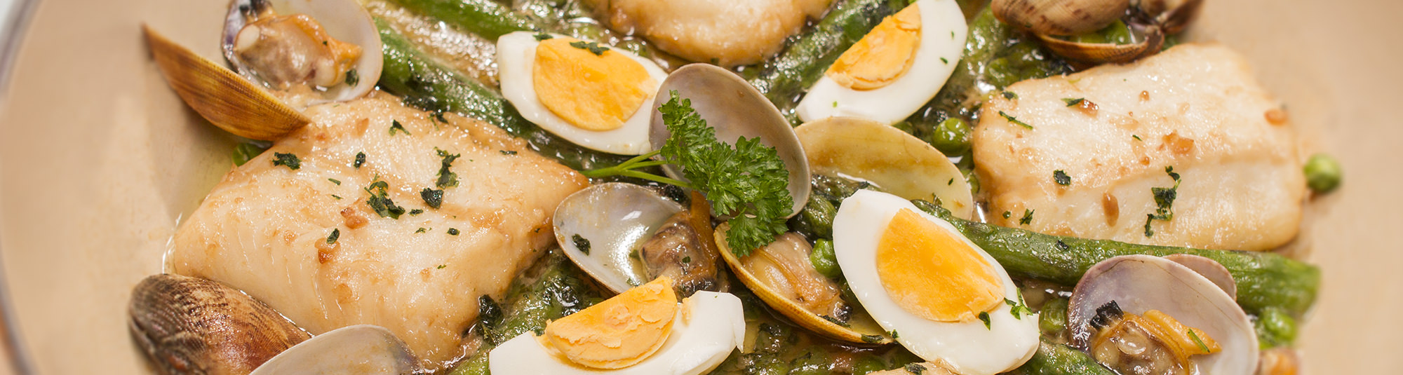 Merluza a la koskera - Receta para impresionar a tus invitados