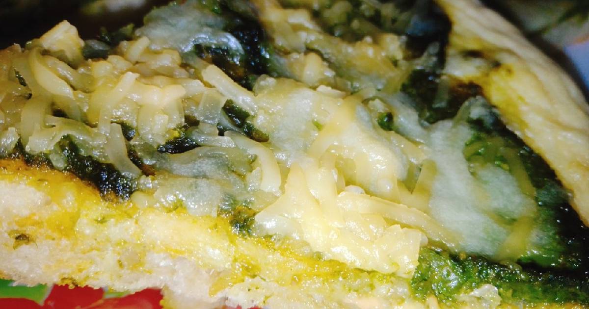 Pizza de bresaola, rúcula y alcachofas