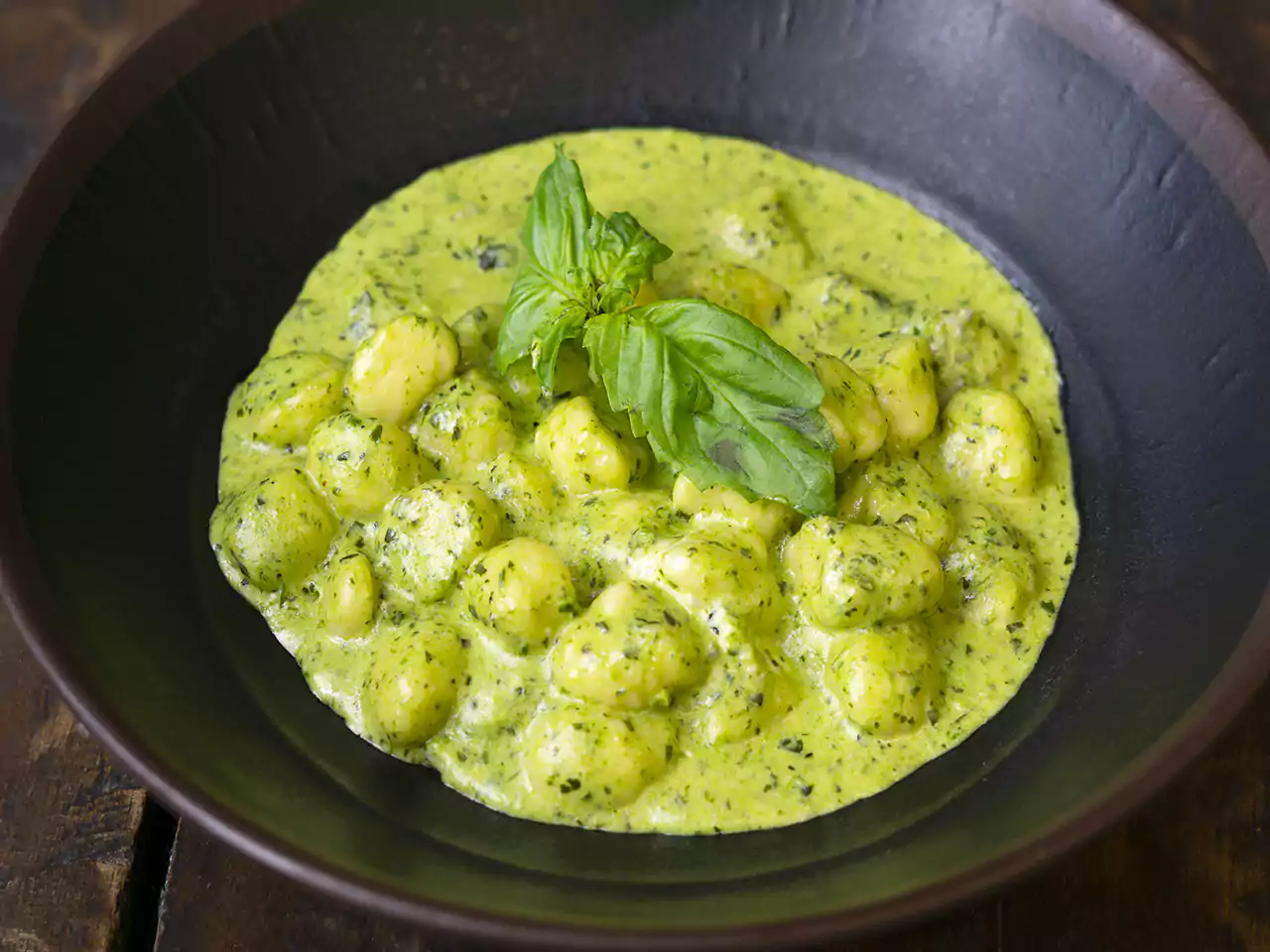 Pizza Quattro Formaggi con queso de cabra y cebolla caramelizada